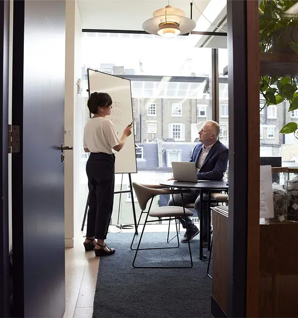 Meeting between a man and woman in an office