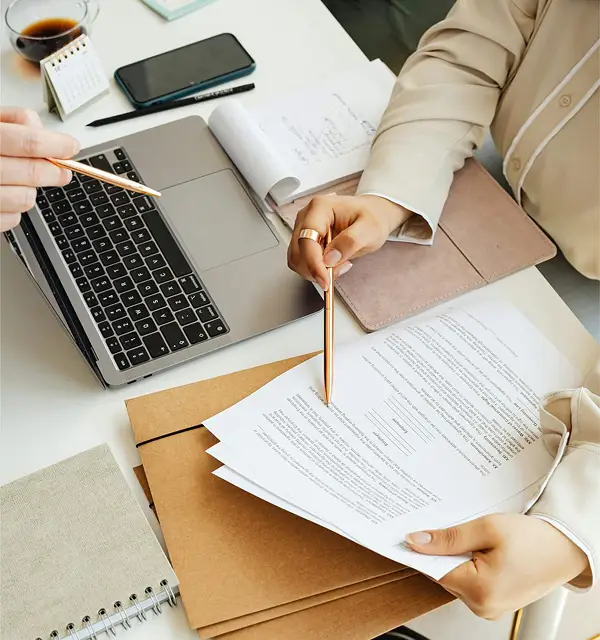 Close up of someone assessing a policy document